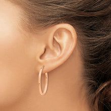 Load image into Gallery viewer, 14k Rose Gold Polished Oval Tube Hoop Earrings
